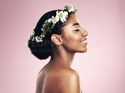 Buy stock photo Woman, smile and beauty of flower crown in studio, pink background and spring aesthetic. Face of happy african model, natural skincare and floral hair wreath for vegan cosmetics, makeup and shine 