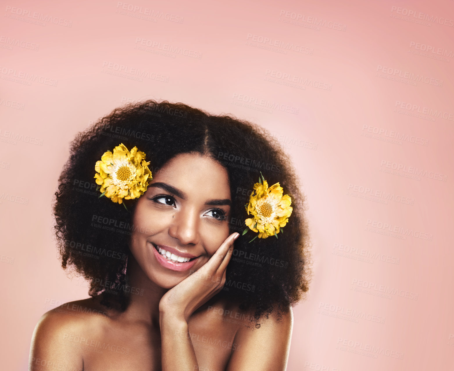 Buy stock photo Happy woman, thinking and flowers for hair care, beauty and studio background with mockup of natural skincare. Face, african model and daydream with floral plants, afro and sustainable cosmetic ideas