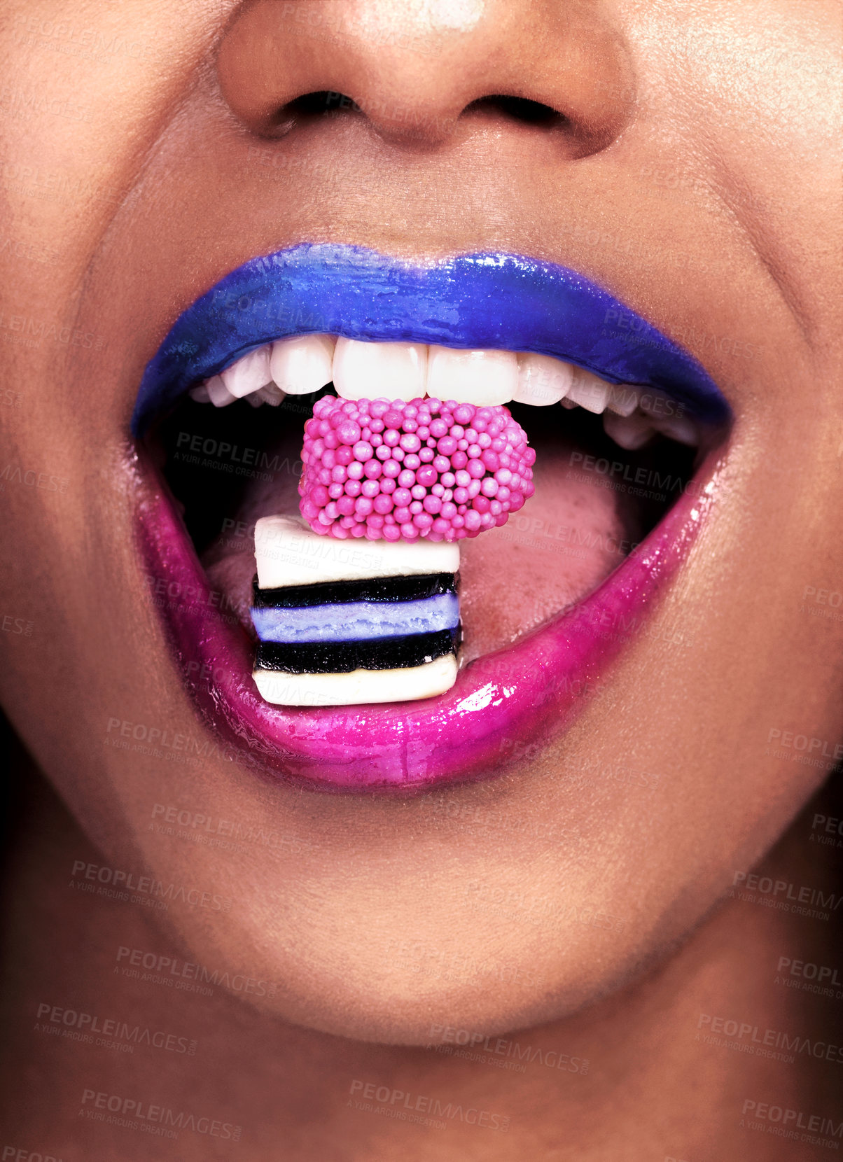 Buy stock photo Eating, lipstick and black woman with candy for sweets, luxury and biting isolated on pink background. Mouth, gen z girl with licorice for food, wellness and happy on studio backdrop by mockup
