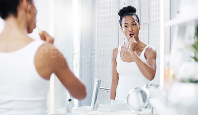 Buy stock photo Woman brushing teeth in bathroom, mirror with dental and oral hygiene with morning routine, toothbrush and health. Female person at home, grooming and self care with clean mouth and wellness