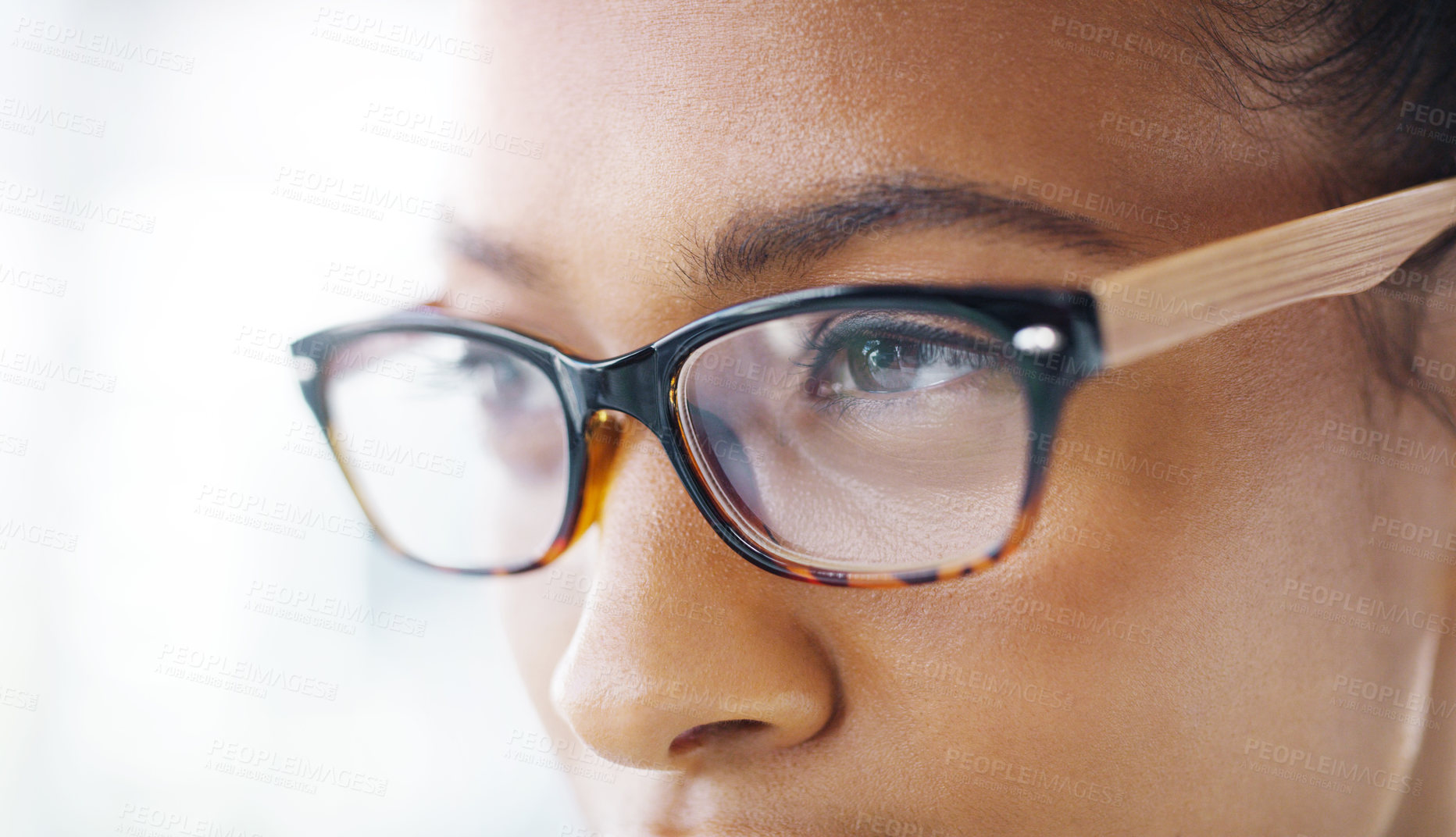 Buy stock photo Closeup shot of an attractive young businesswoman wearing spectacles in a modern office