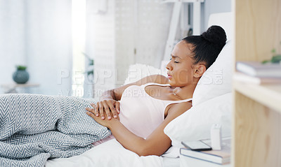 Buy stock photo Woman in bed, stomach pain and menstruation cramps with  endometriosis, health problem and sick. Female person with digestion issue, abdominal ache and period with gastrointestinal emergency at home
