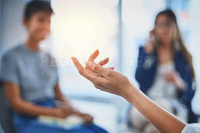 Buy stock photo Closeup shot of an unrecognzable businesswoman's hands gesturing during a meeting with her colleagues at work