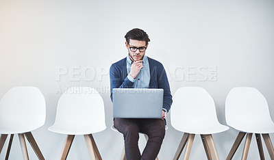 Buy stock photo Waiting room, businessman and laptop for hiring, planning and research online for hr interview questions. Chairs, male candidate and digital for information, recruitment and review portfolio for work