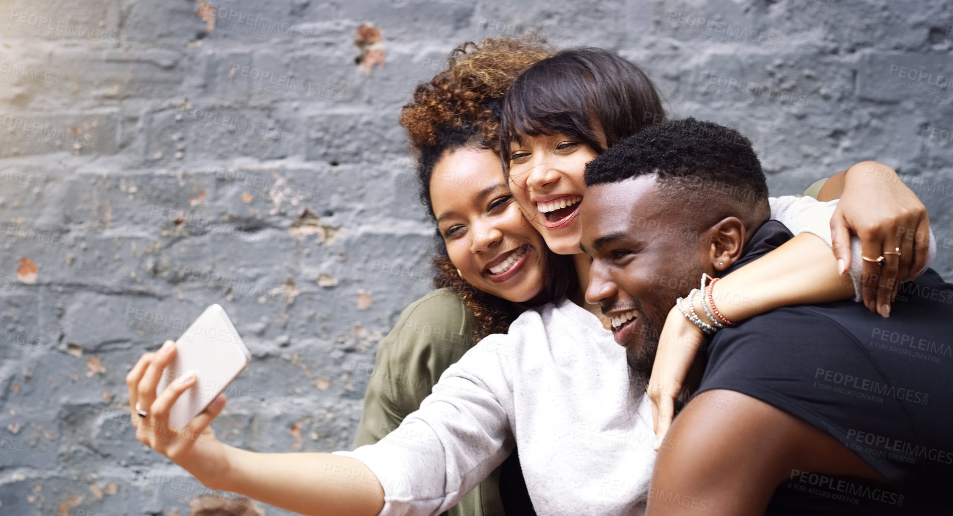Buy stock photo Selfie, social media and smile with friends on brick wall background for profile picture update. App, energy or excitement with happy man and woman group in city for mobile or online photography