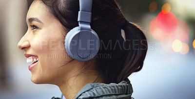 Buy stock photo Woman with headphones in city, profile and listening to music, freedom and happy with technology outdoor. Mockup space, podcast or radio streaming, female person in urban street and audio playlist