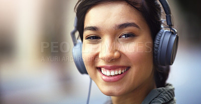 Buy stock photo Woman in portrait, headphones in city and smile listening to music, freedom and technology outdoor. Mockup space, podcast or radio streaming with happy female person, urban and audio playlist