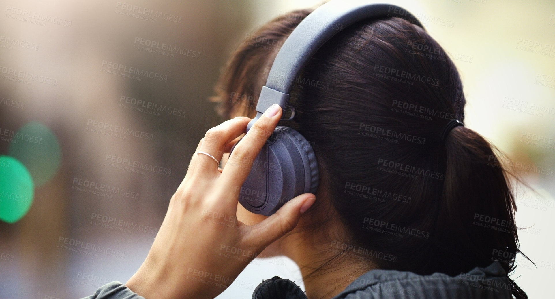 Buy stock photo Woman with headphones in city, back view and listen to music, freedom and technology outdoor. Mockup space, podcast or radio streaming with female person in urban street and audio playlist