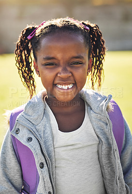 Buy stock photo Portrait of an elementary school girl standing outside