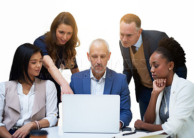 Buy stock photo Cropped shot of a diverse group of businesspeople having a discussion while using a laptop in a modern office