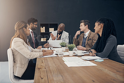 Buy stock photo Shot of a group of Shot of a group of young businesspeople having a meeting in a modern office having meeting at work