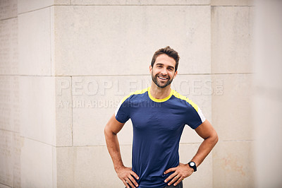 Buy stock photo Portrait of a sporty middle-aged man standing with his hands on his hips