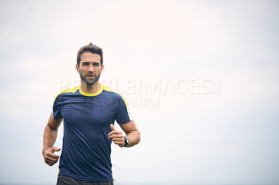 Buy stock photo Cropped shot of a middle aged man out running