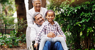 Buy stock photo Grandparents, park and a senior man in a wheelchair together with his wife and adorable granddaughter. Person with a disability, love or time with a happy girl child and her mature family in a garden