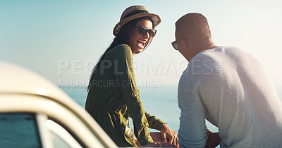 Buy stock photo Happy couple, laughing and beach with car for road trip, funny joke or outdoor travel in nature. Young man and woman with smile, sunglasses and vehicle for fun holiday, summer or stop by ocean coast