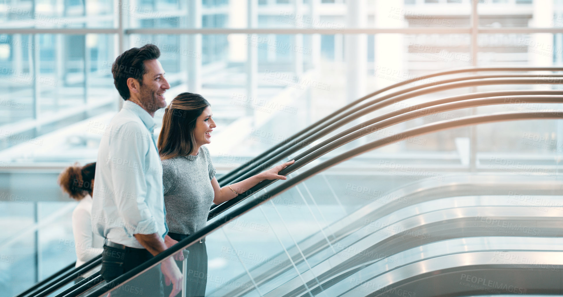 Buy stock photo Escalator, morning and business people in office talking for arrival in lobby for work, job and career. Modern building, corporate team and people on electrical stairs chat, speaking and conversation