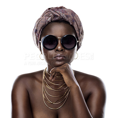 Buy stock photo Portrait of a beautiful young woman striking a pose while wearing sunglasses against a white background
