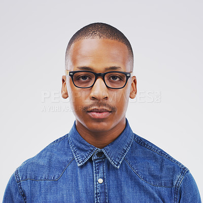 Buy stock photo Portrait, African and man in white background in studio with serious, face and glasses in mockup space. Black, male person and trendy, eyewear and isolated in backdrop for fashion, style and model