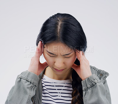 Buy stock photo Girl, headache and pain in studio, stress and burnout or anxiety for mental health on gray background. Woman, worry and sad for crisis or mistake, migraine and distress on mockup space or massage