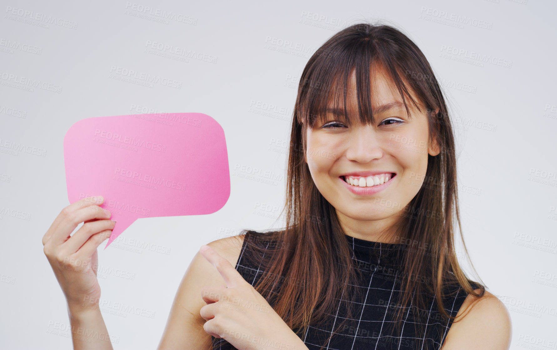 Buy stock photo Happy woman, portrait or speech bubble with mockup space, questions or FAQ on white background. Excited girl smiling or pointing to chatting sign, social media for comment, message or communication 