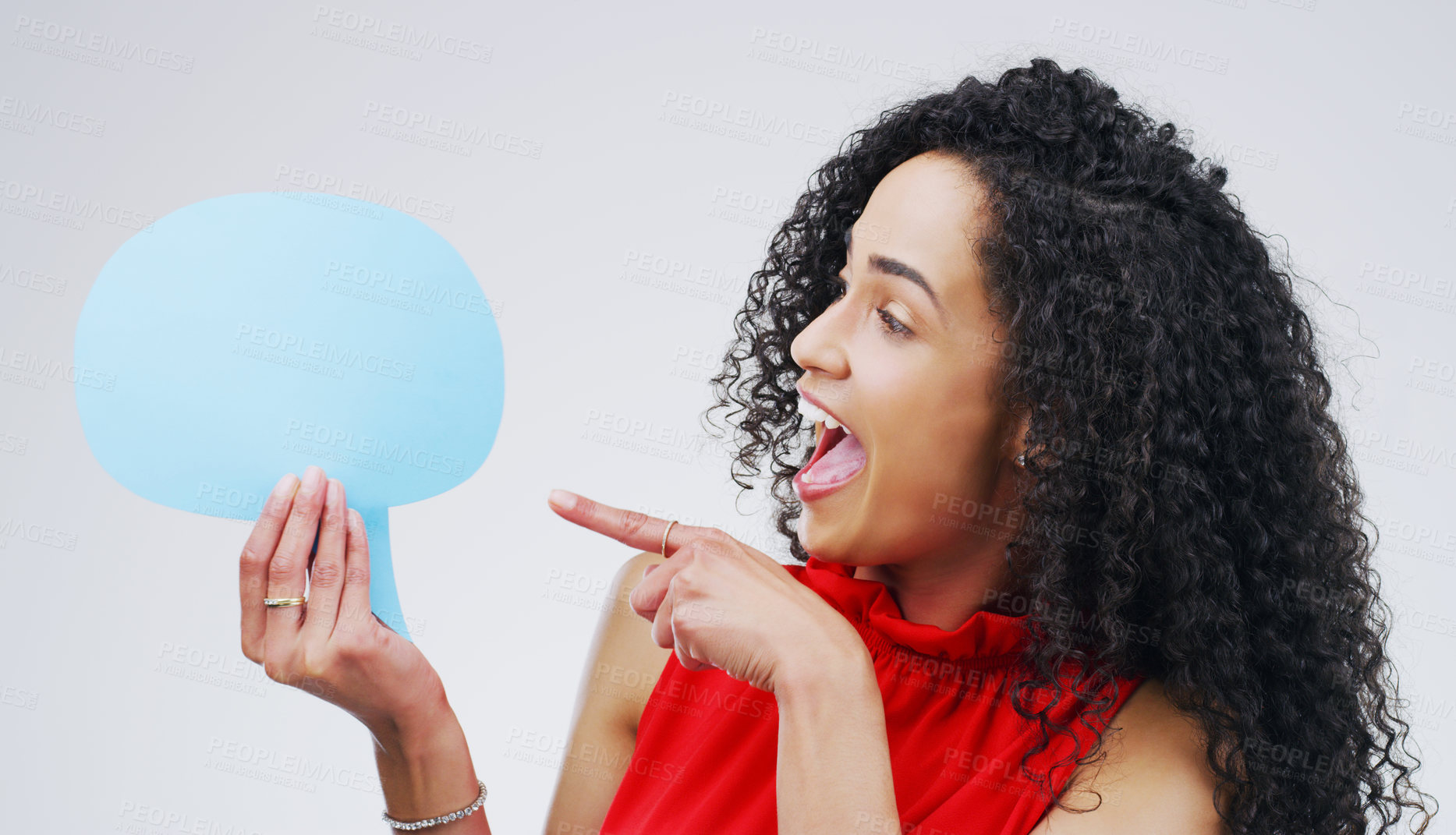 Buy stock photo Woman, pointing and happy in studio with speech bubble, gesture and idea for promotion and advertising. Opinion, faq and quote for product placement, answer for conversation on white background