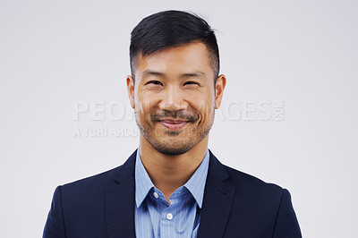 Buy stock photo Portrait, entrepreneur and Asian man with a corporate career and confident agent against a white studio background. Face, male person and lawyer in a suit, professional and employee with happiness