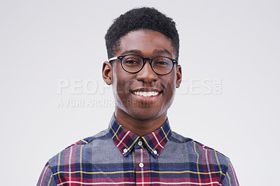 Buy stock photo Smile, portrait of black man with glasses and happy against a white background. Nerd or geek, happiness and African male smiling with proud facial expression against a studio backdrop for confidence