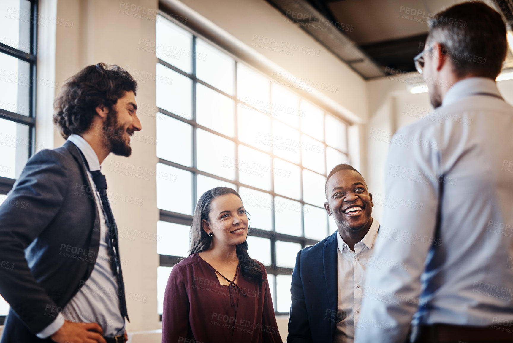 Buy stock photo Diversity, talk and meeting in office with team, casual chat and brainstorming ideas. People, funny story and communication in workplace for inspiration, motivation and weekend catch up in morning