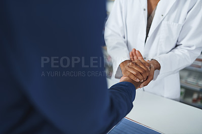 Buy stock photo Pharmacy, holding hands and pharmacist with customer for empathy for prescription, medicine and medication. Healthcare, pharmaceutical and patient at counter for medical care, service and help