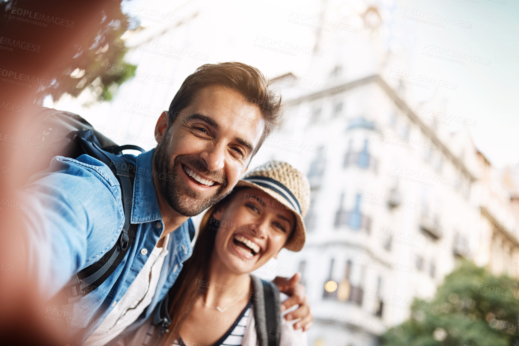 Buy stock photo Tourist couple, selfie and happy in a city for travel on a street with a partner for holiday memory. Face of a man and woman outdoor on urban road for adventure, journey or vacation photo for freedom