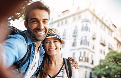 Buy stock photo Selfie, tourist couple and outdoor in a city for travel on a street with a happy smile. Man and woman together for summer holiday memory on urban road for adventure, journey and vacation or freedom