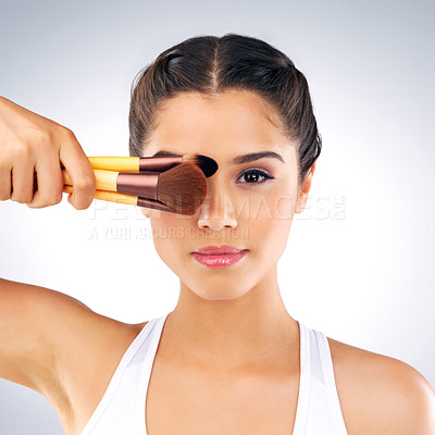 Buy stock photo Woman, hand and makeup brush for beauty, cosmetic and portrait on white background. Face, foundation and powder for glow and equipment or tools for female person, skincare and facial for application