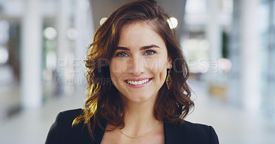 Buy stock photo Cropped shot of a confident young businesswoman working in a modern office