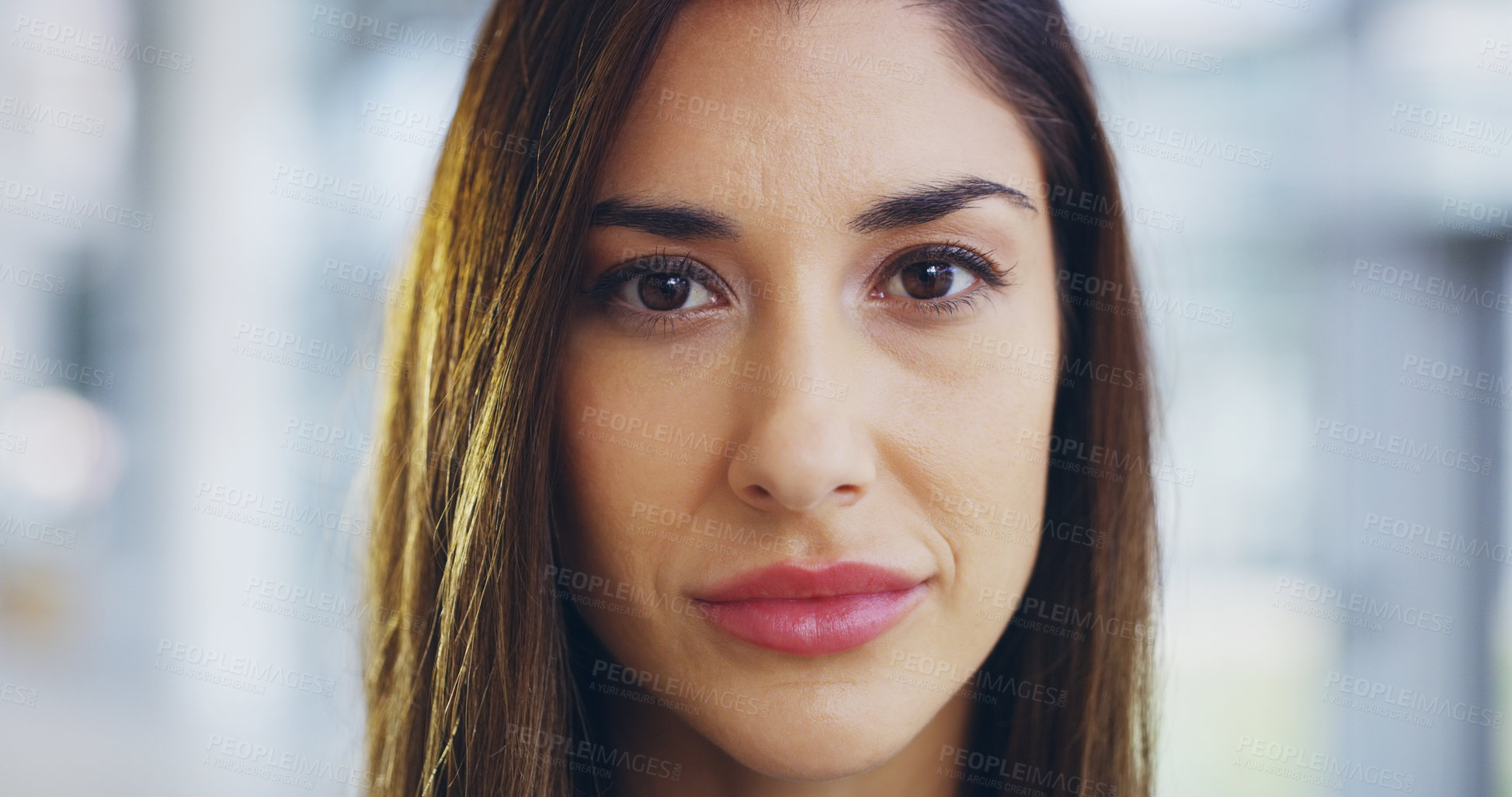 Buy stock photo Cropped shot of a confident young businesswoman walking through a modern office