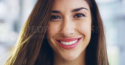 Buy stock photo Cropped shot of a confident young businesswoman walking through a modern office