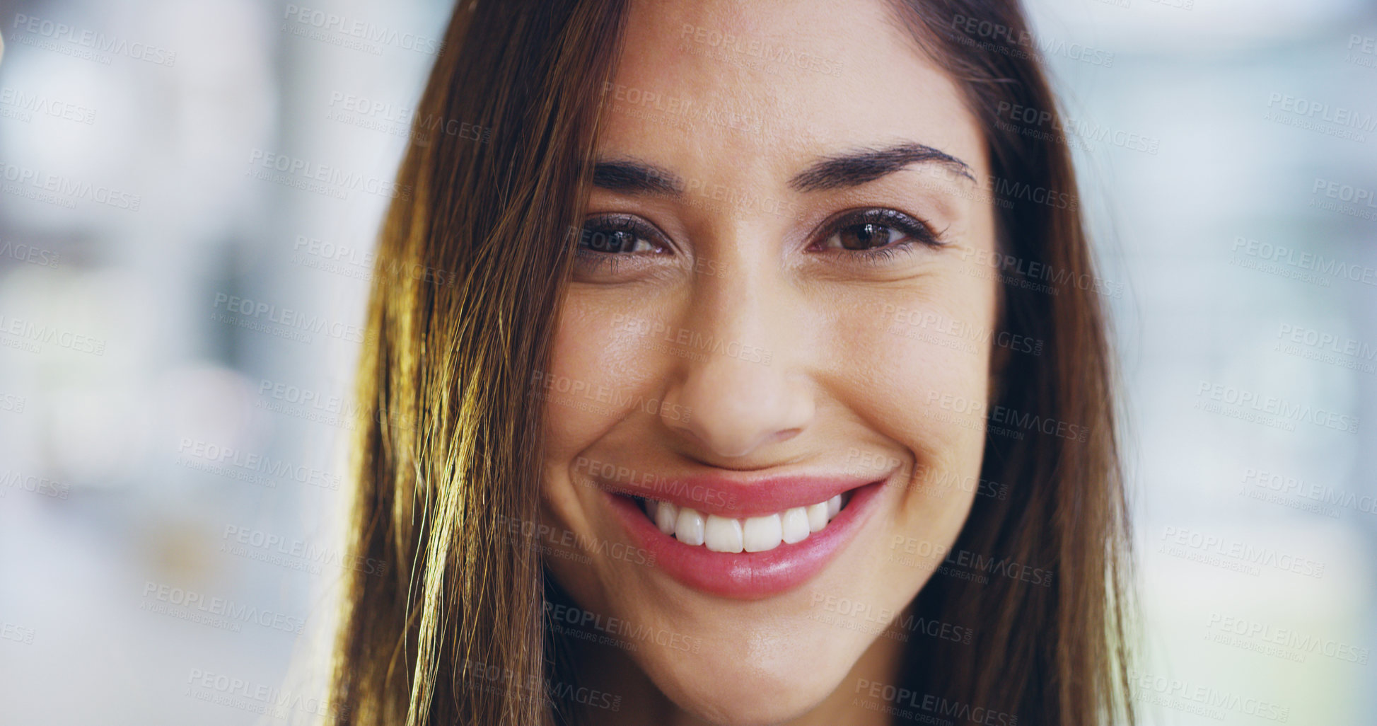 Buy stock photo Cropped shot of a confident young businesswoman walking through a modern office