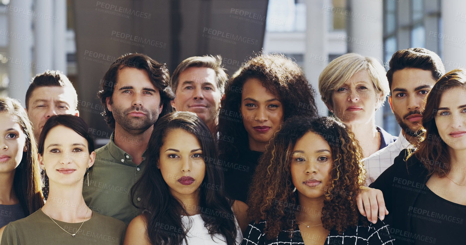 Buy stock photo Cropped shot of a group of businesspeople standing in their workplace