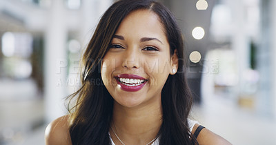 Buy stock photo Cropped shot of a confident young businesswoman working in a modern office