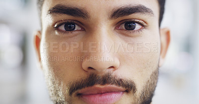 Buy stock photo Cropped shot of a young handsome businessman in a modern office