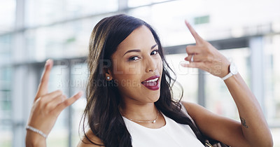 Buy stock photo Cropped shot of a young businesswoman showing a shaka hand sign while walking through a modern office