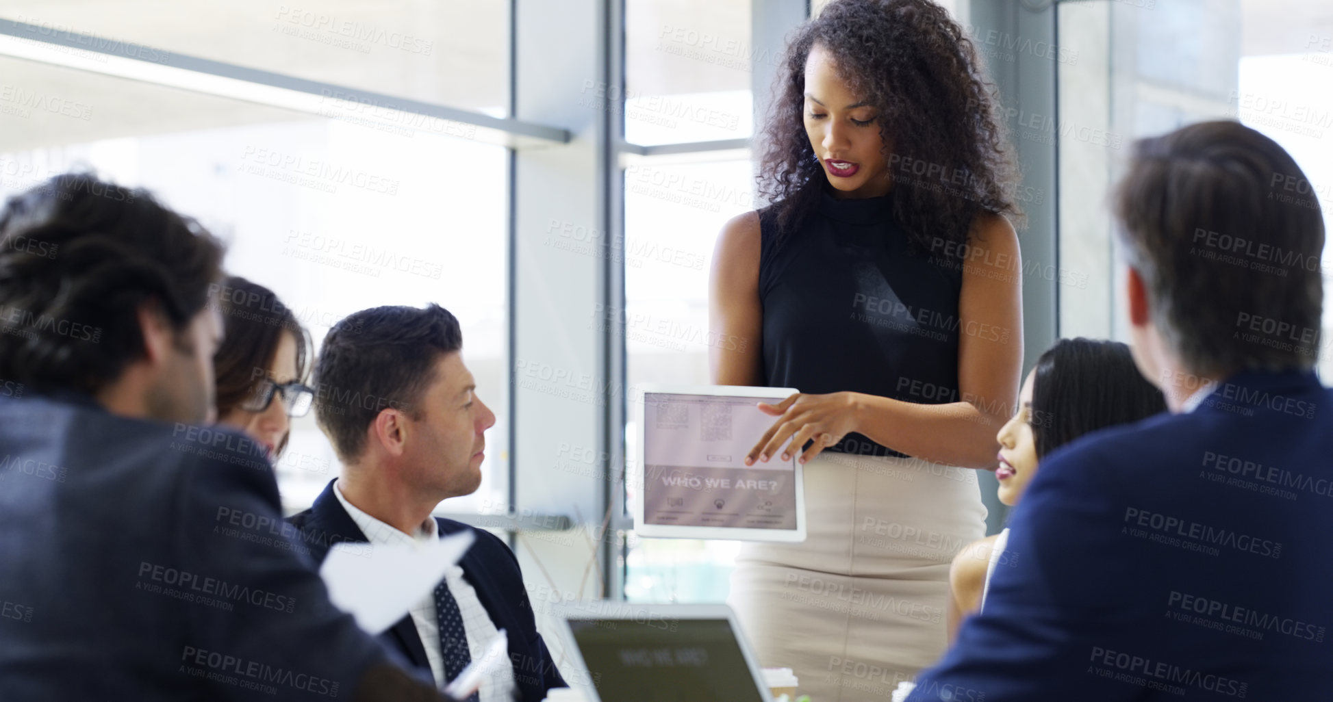 Buy stock photo Meeting, report and tablet with business people in boardroom of office together for presentation. Feedback, info and technology with woman employee talking to clients in workplace for introduction