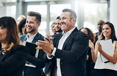 Buy stock photo Cropped shot of a group of businesspeople applauding during a seminar in the conference room