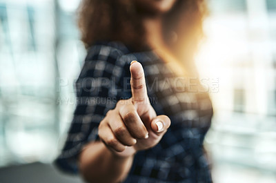 Buy stock photo Cropped shot of an unrecognizable businesswoman connecting to a user interface with her finger in a modern office
