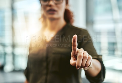 Buy stock photo Cropped shot of an unrecognizable businesswoman connecting to a user interface with her finger
