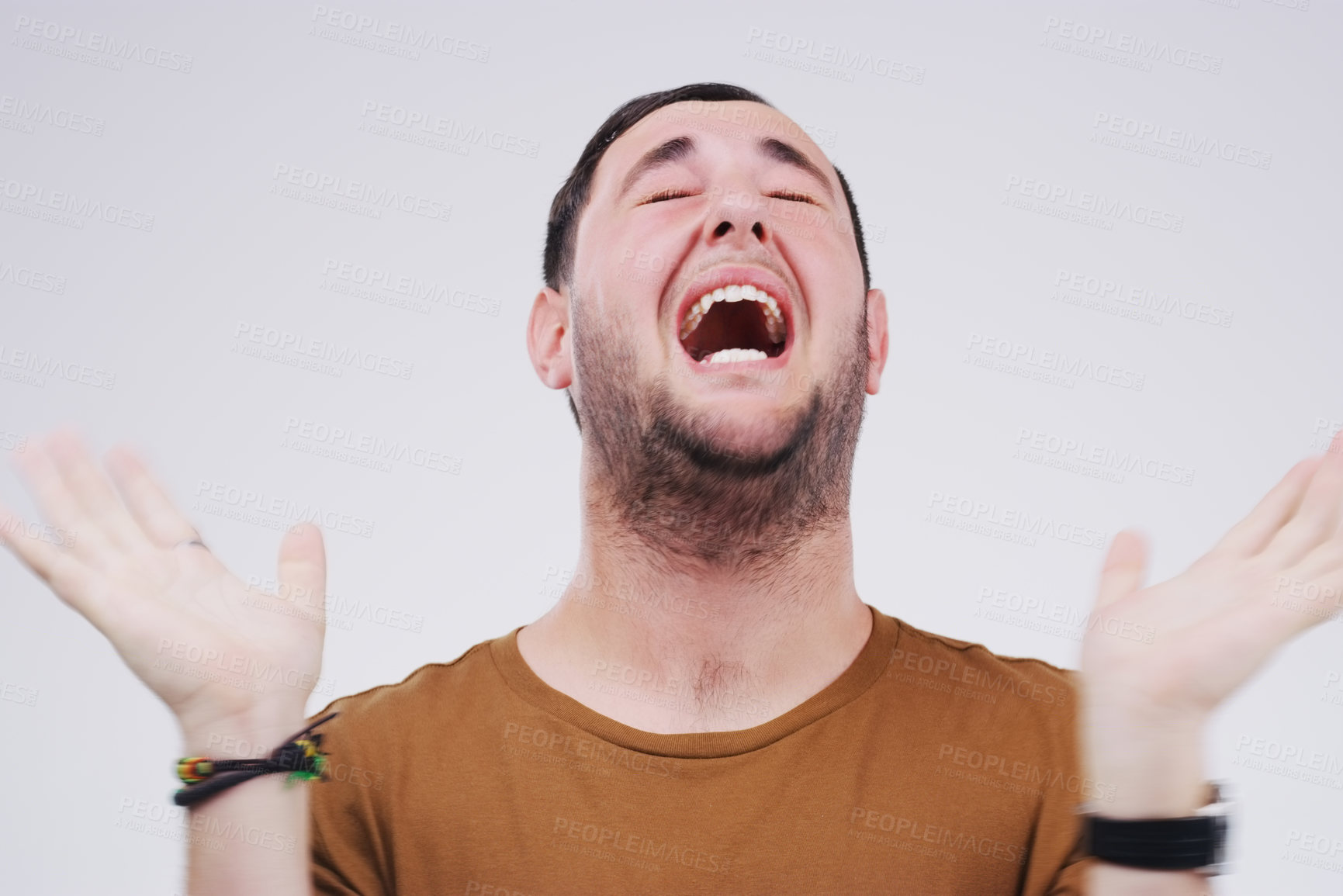 Buy stock photo Face, news and wow with excited man in studio isolated on gray background for reaction to gossip. Expression, surprise and winner with happy young person screaming in joy at bonus or competition