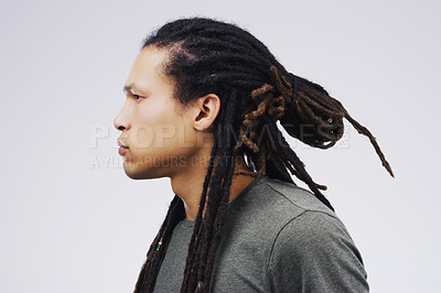 Buy stock photo Man, dreadlocks and hair style in studio with beauty grooming or barber self care, mockup space or white background. Male person, model and profile for proud confidence or unique, serious or identity