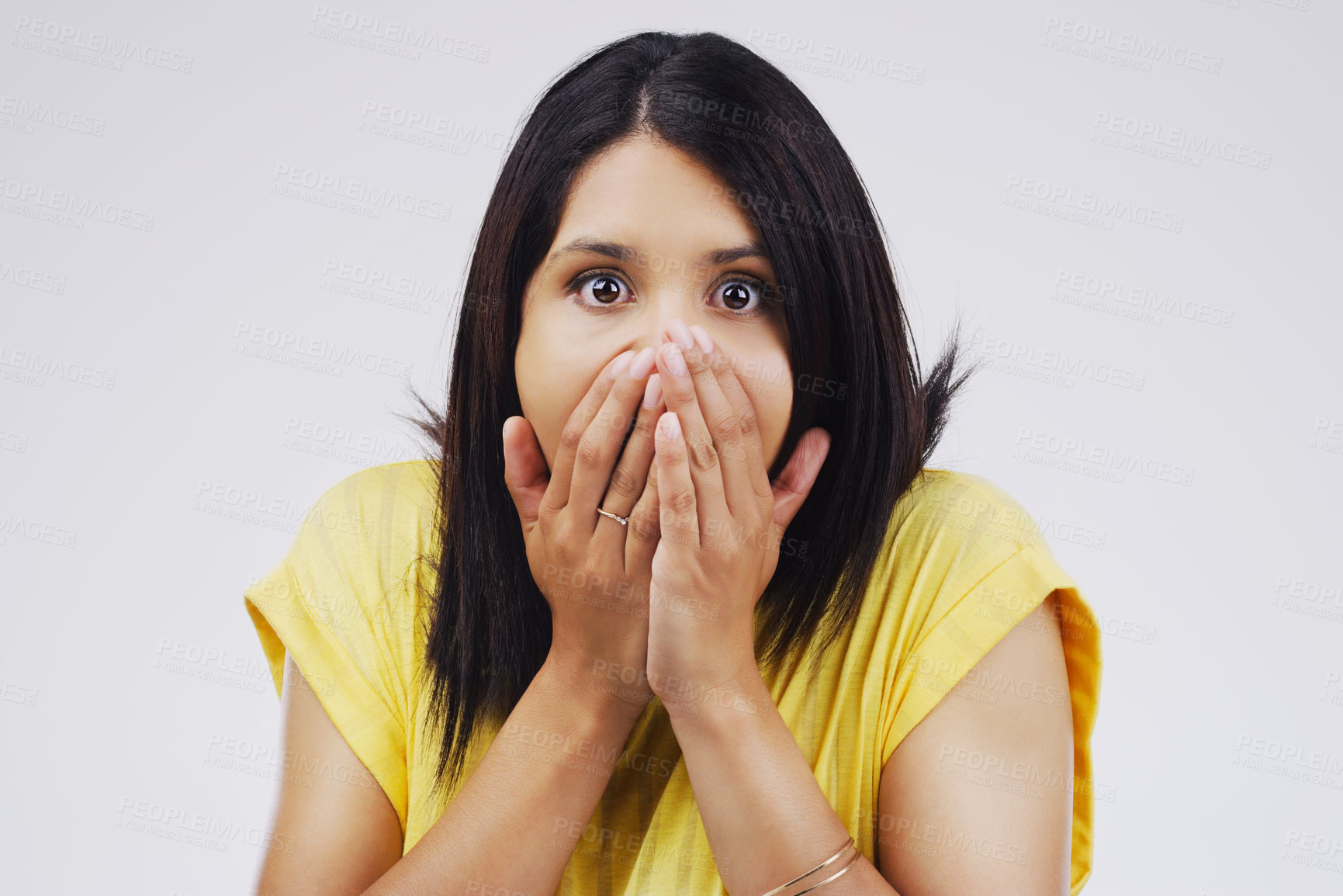 Buy stock photo Shock, gossip and portrait of woman in studio for fake news, announcement or mistake with worry. Surprise, emotion and person with hands on mouth for wow, omg or wtf expression by gray background.