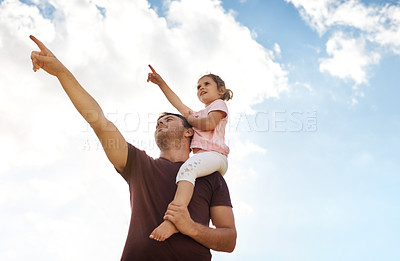 Buy stock photo Sky, father and kid on shoulder with pointing for bonding adventure, growth and development for children. Support, dad and girl with outdoor view, showing and fun learning together on weekend morning