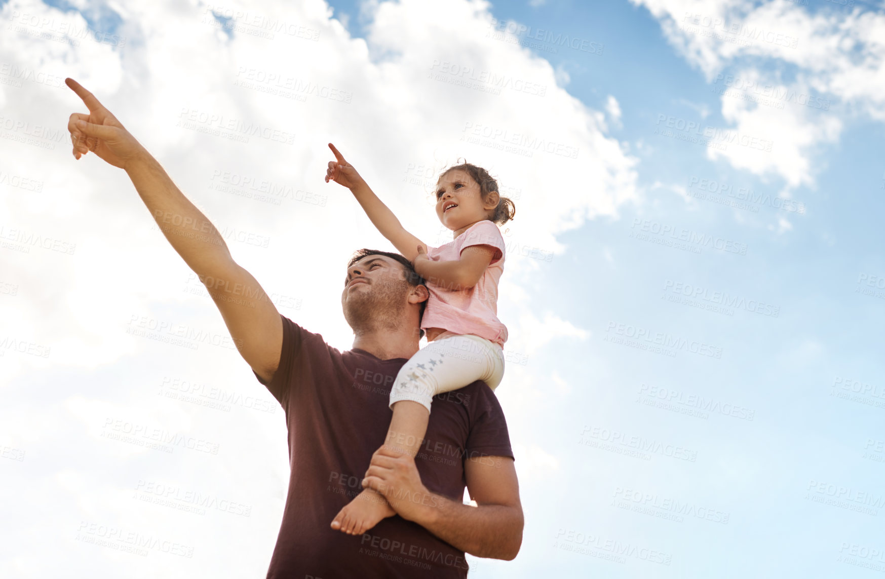 Buy stock photo Sky, father and kid on shoulder with pointing for bonding adventure, growth and development for children. Support, dad and girl with outdoor view, showing and fun learning together on weekend morning