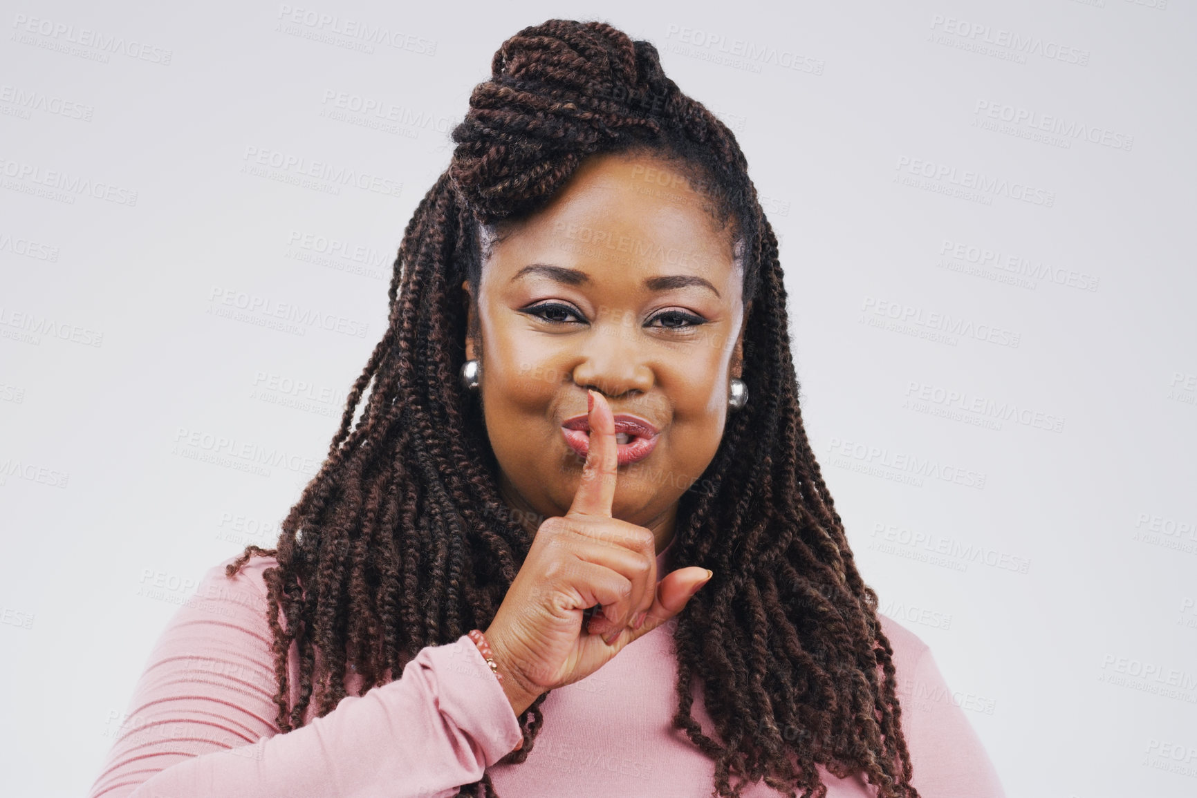 Buy stock photo African woman, finger on lips and portrait in studio for secret news, privacy and gossip for confidential. Young people, hush gesture and emoji or sign for silent, quiet or warning for mysterious 